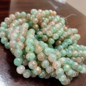8crazy0003- 1 STRAND OF LIGHT GREEN-PEACH DUAL TONE 8MM ROUND CRAZY GLASS BEADS