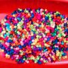 FINDINGS0028- 470 PCS MIX COLOR PLASTIC HANGING BALL OR NOISELESS GHUNGROO FOR JEWELLERY MAKING- 25 GRAMS PACK