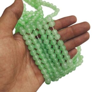 RGLASS0006- 1 STRAND LIGHT GREEN 8MM ROUND GLASS BEADS