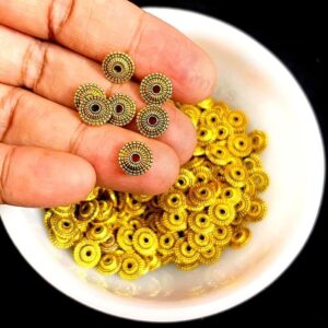 OXIBEADG0009- 50 GM PACK OF GOLDEN ROUND MOTIF GERMAN SILVER METAL BEADS