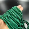RGLASS0064 – 1 STRAND DARK GREEN 6MM ROUND GLASS BEADS