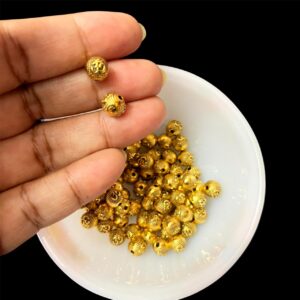 OXIBEADG0023- 50 GM PACK OF GOLDEN OM GERMAN SILVER METAL BEADS